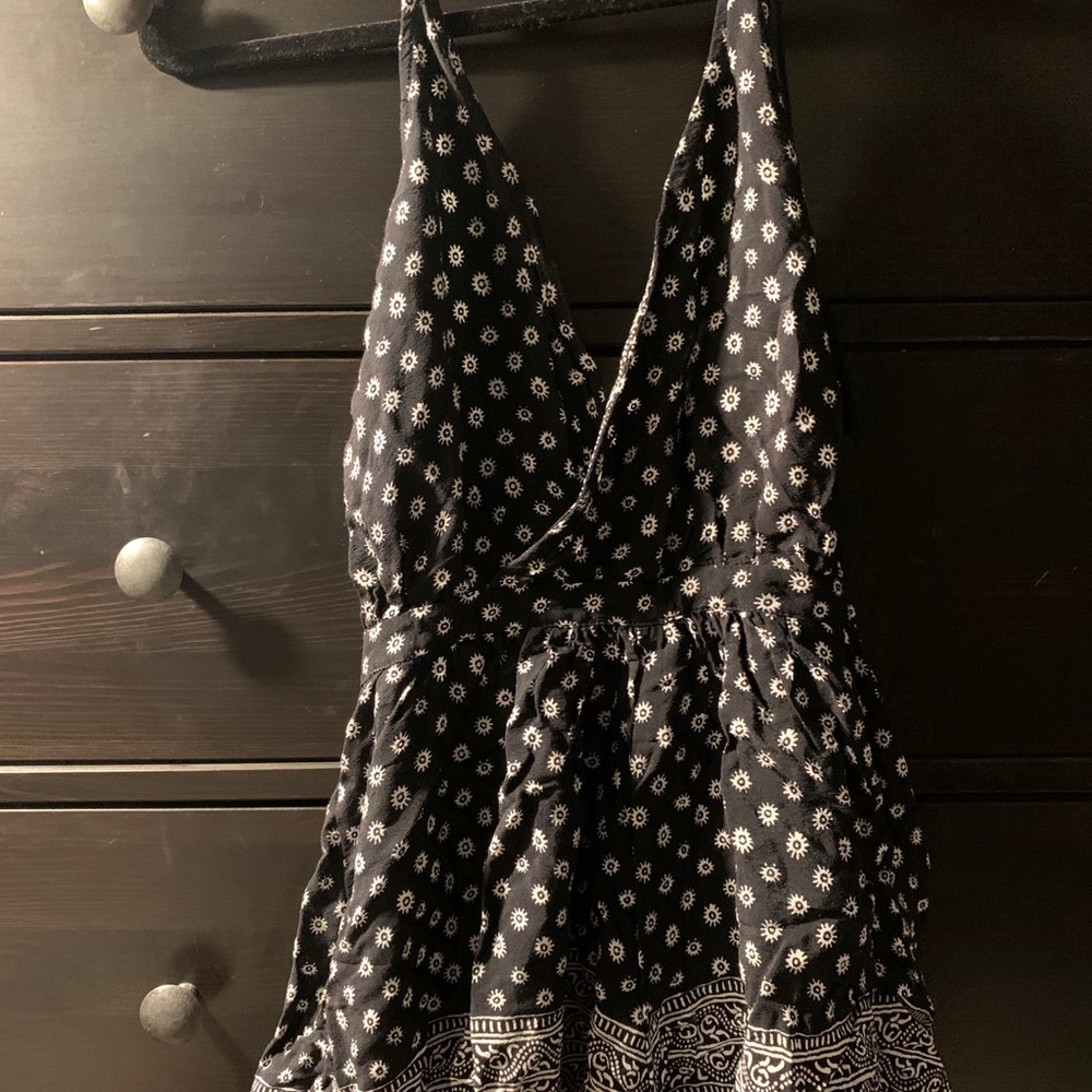 Olivaceous Black and White Halter Floral Patterned Romper - Picture 3 of 9